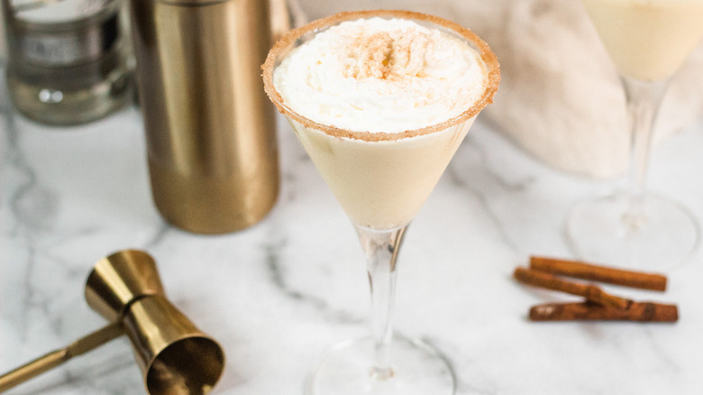 eggnog martini with cinnamon sticks