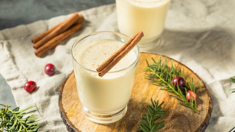 Eggnog with cinnamon stick