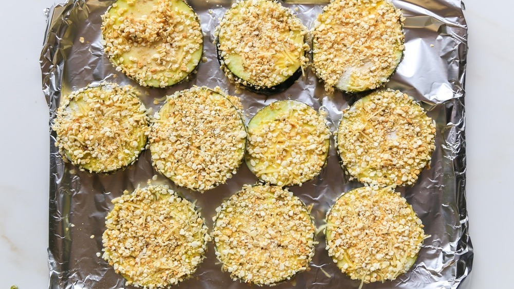 eggplant in breadcrumbs ready for oven for eggplant parmesan recipe