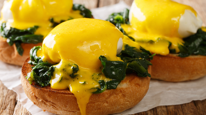 Eggs florentine served with hollandaise sauce