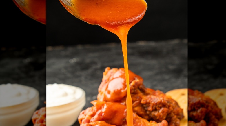 Buffalo sauce drizzled on wings