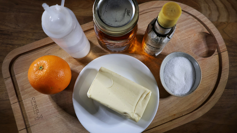 overhead view of Irish butter-washed Old Fashioned ingredients on a cutting board