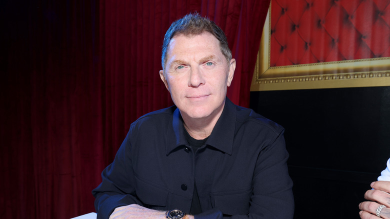 Bobby Flay looking into camera with slight smile