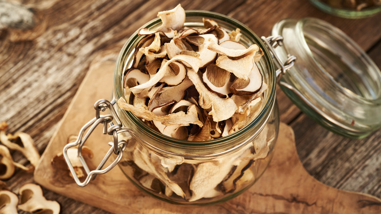 dried porcini mushrooms in a hinged glass jar