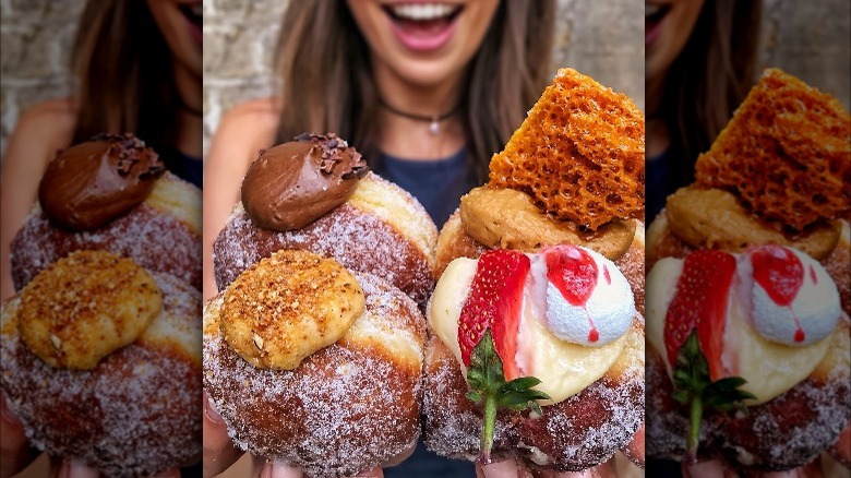 Eloise Head holding donuts