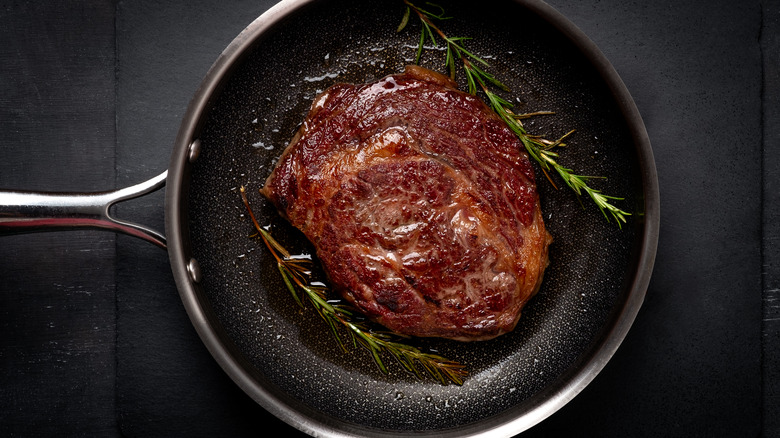 steak in frying pan