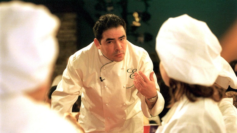 Emeril Lagasse talking to chefs