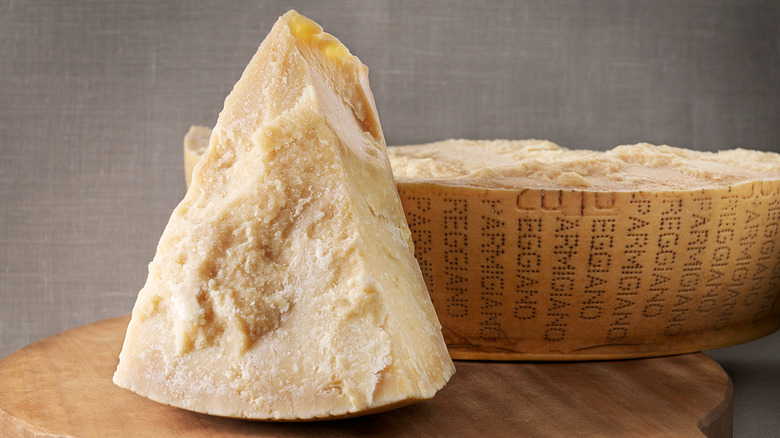 A sliced wheel of Parmigiano Reggiano