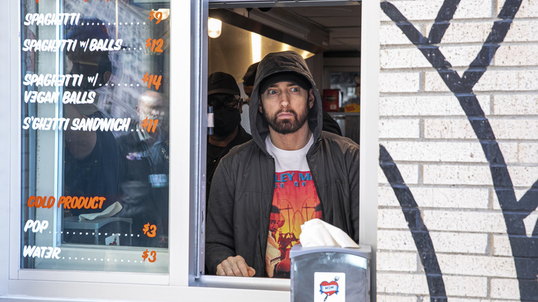 Storefront with Eminem at window