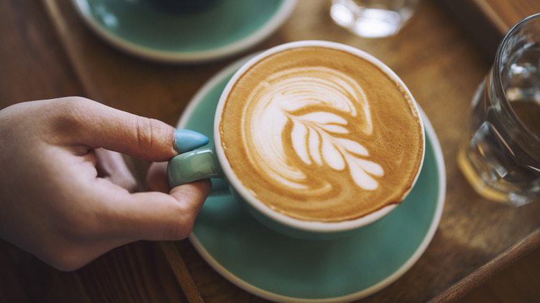 cup of coffee with steamed milk