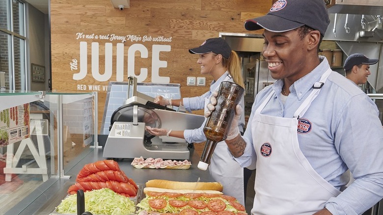 Jersey Mike's workers making sandwiches