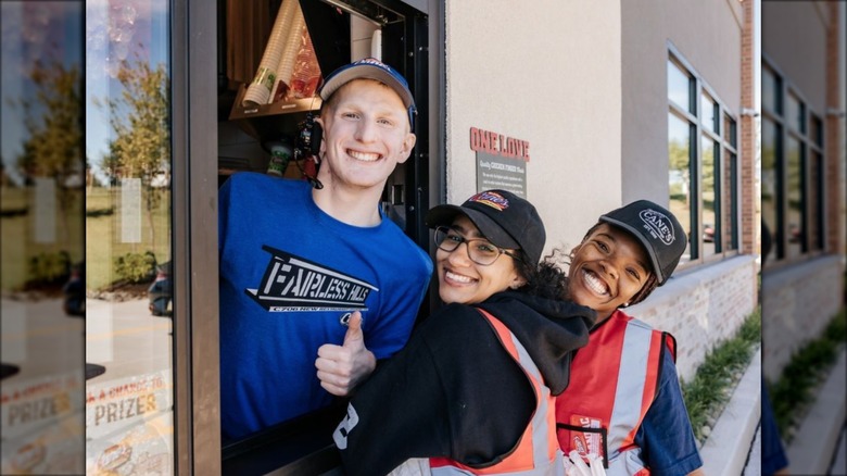 raising canes employees smiling 