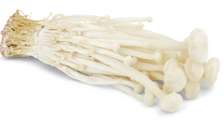 Enoki mushrooms laying flat