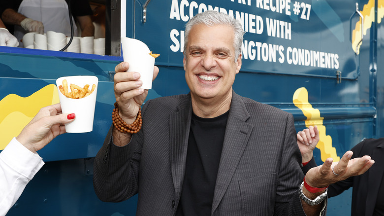 Eric Ripert holds french fries