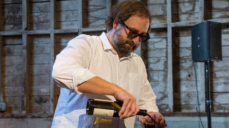 Eric Wareheim pouring wine