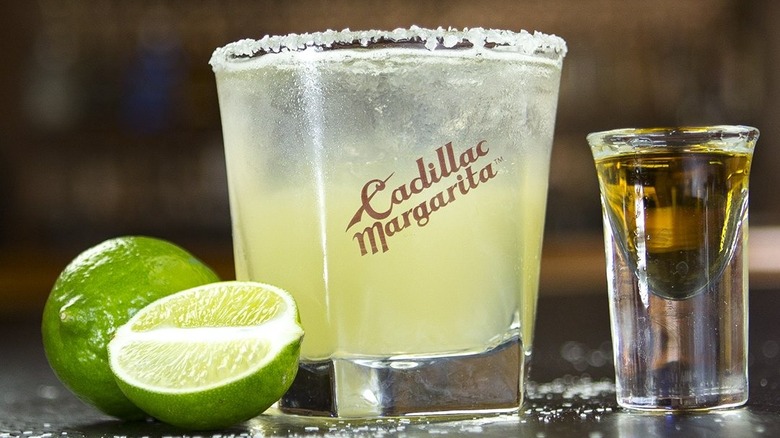 Cadillac margarita with lime and tequila shot