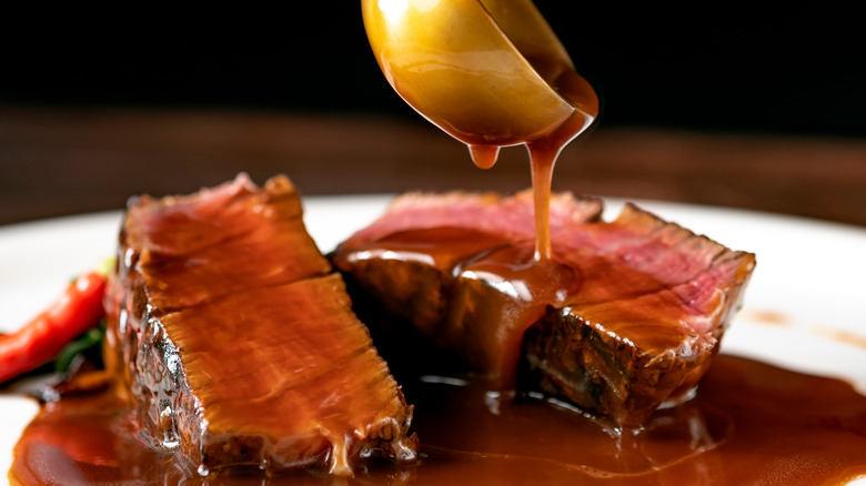 Demi-glace sauce over steak