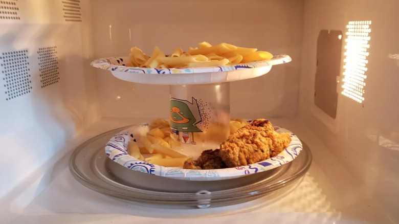 Two plates balanced in a microwave