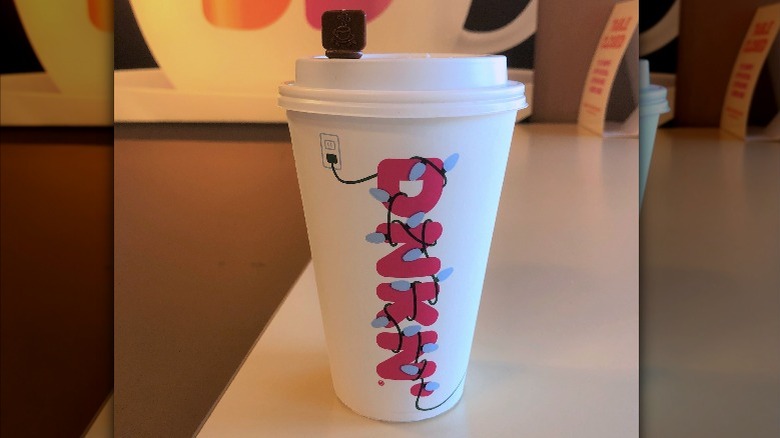 a cup of dunkin' donuts holiday blend drip coffee