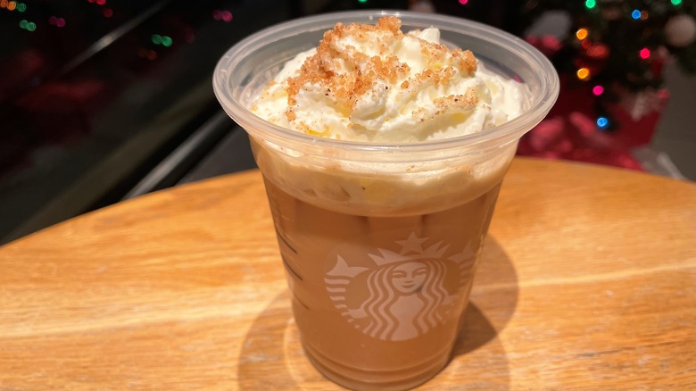 Iced caramel brulee latte with brulee bits topping