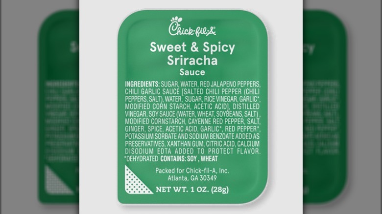 A container of Sweet and Spicy Sriracha Sauce