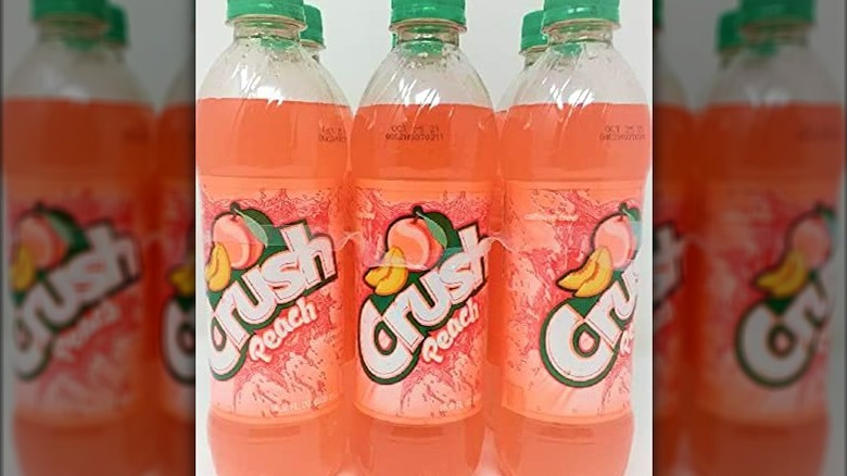 A six pack of Crush Peach bottles