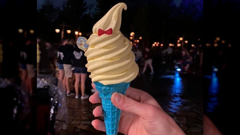 lemon dole whip snow white cone in the magic kingdom at disney world