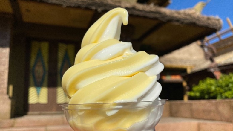 cup of coconut pineapple swirl Dole Whip in the Magic Kingdom at disney world