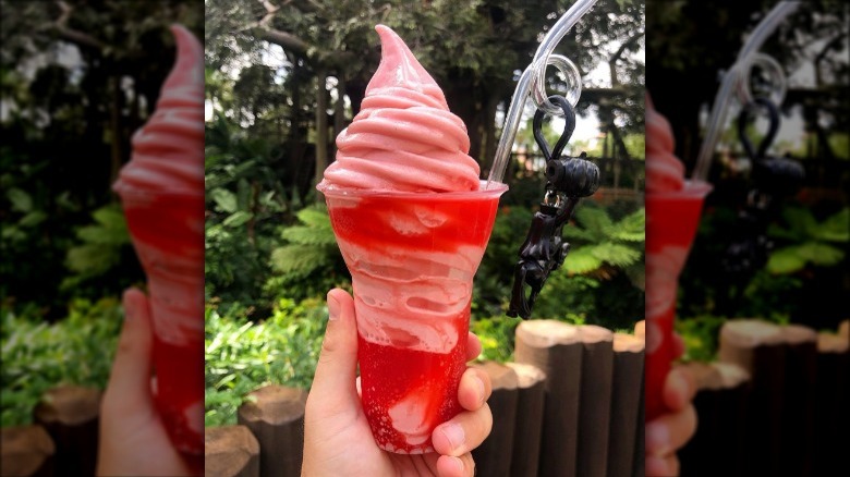 a fanta strawberry dole whip float in the magic kingdom