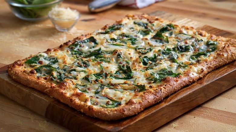 spinach and feta domino's pizza on board