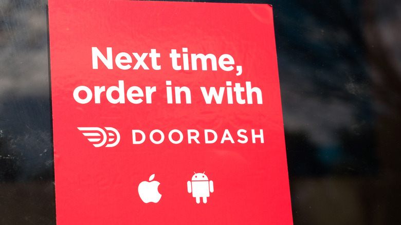 DoorDash sign on window