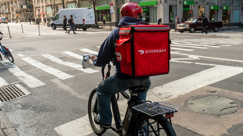 DoorDash driver riding bike