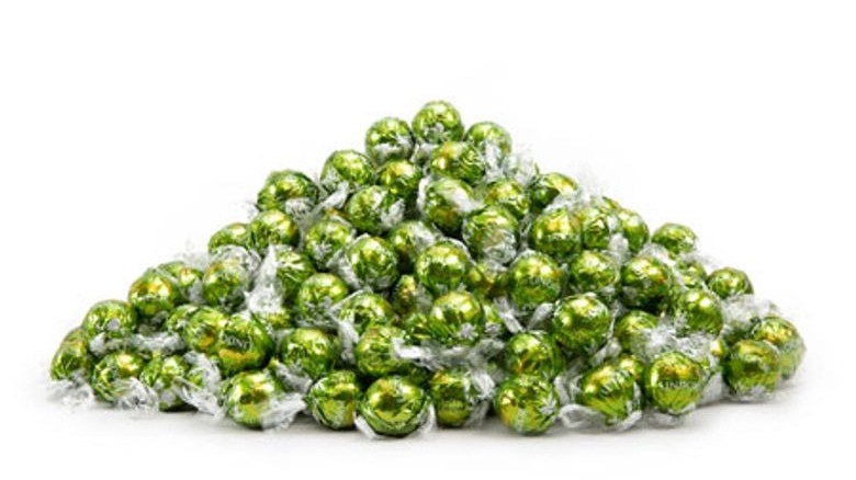 Pile of pistachio green truffles