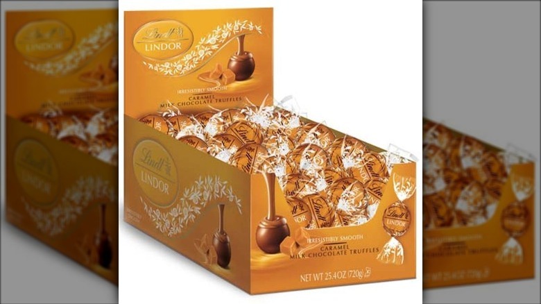 Box of deep gold covered chocolates wrapped