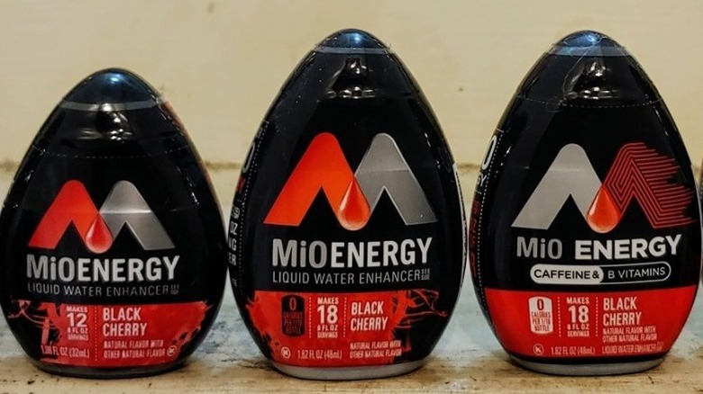 Three containers of MiO Energy Black Cherry water enhancer