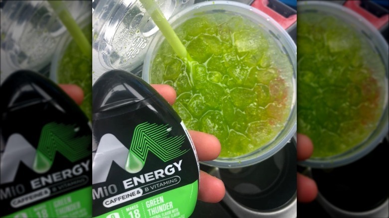 MiO Energy Green Thunder container next to icy green drink with straw