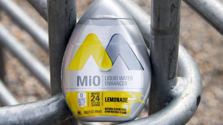 MiO Lemonade water enhancer on a metal railing