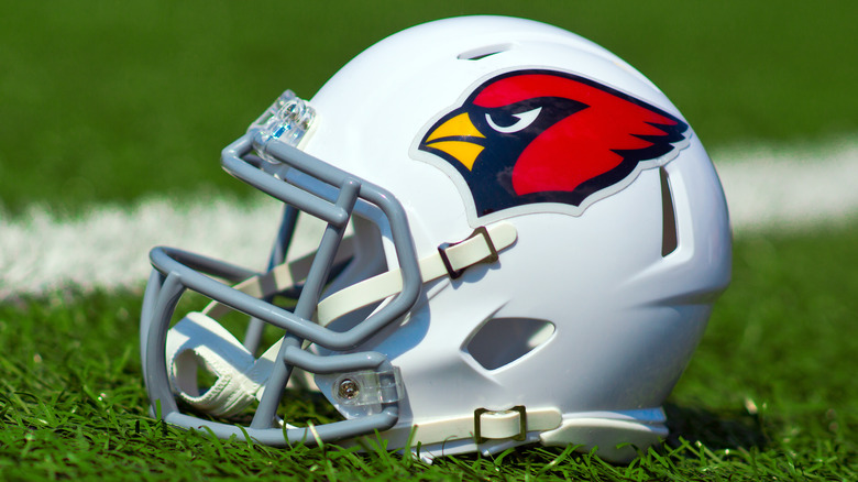 white cardinals helmet on field