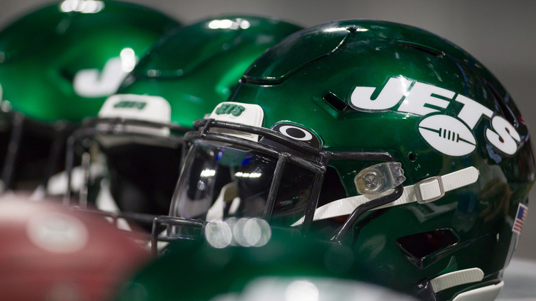 line of green jets helmets