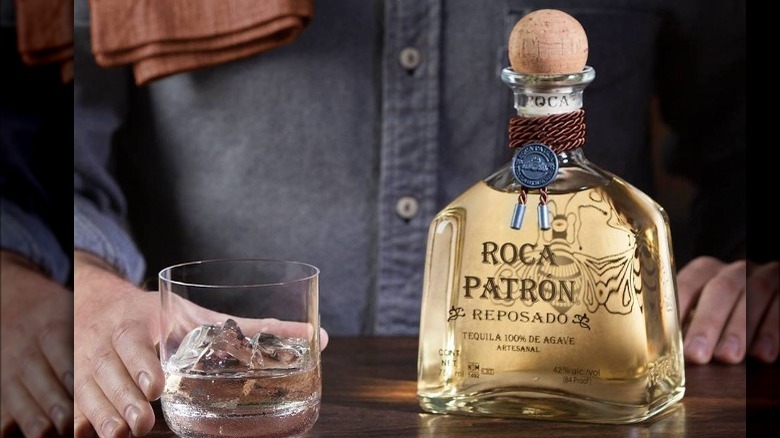 Roca Patrón Reposado bottle, glass