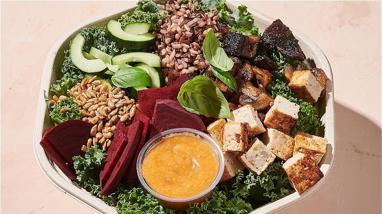 Vegetarian salad bowl with dressing