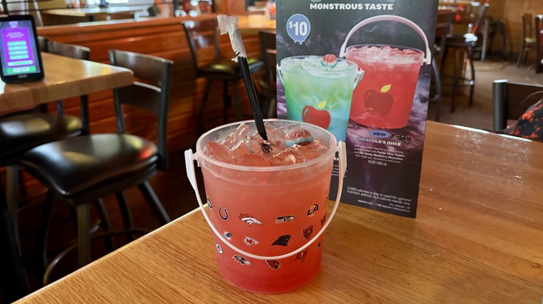 pink/red cocktail in a bucket