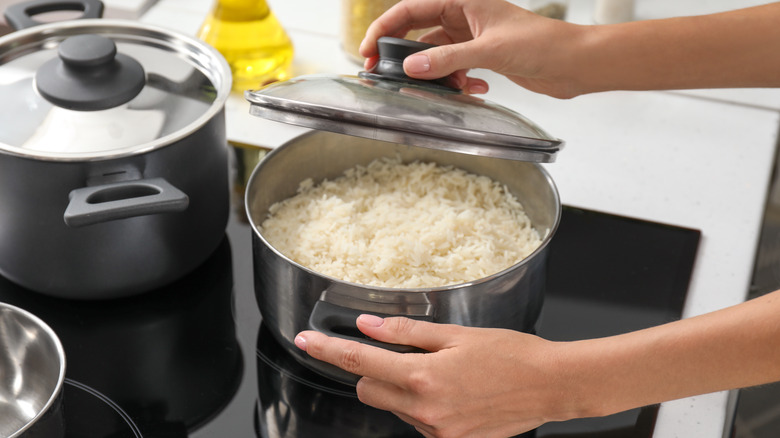 woman cooking rice