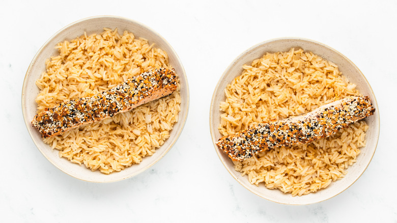 two bowls of rice with everything bagel salmon