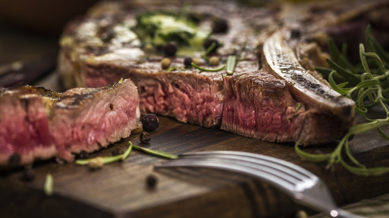 medium rare steak green garnish