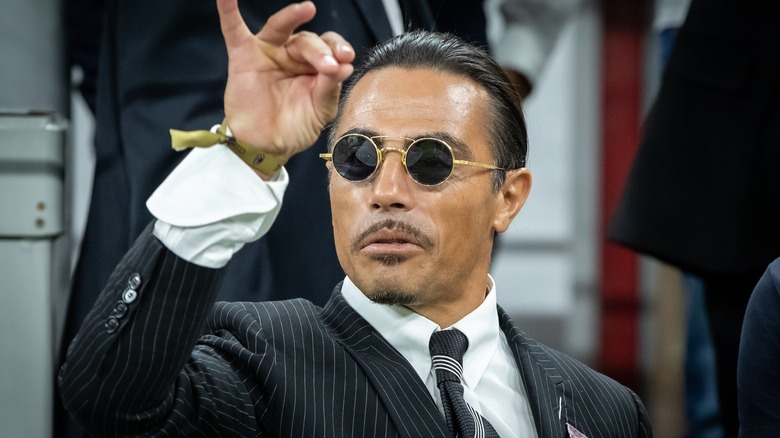 Salt Bae wearing suit