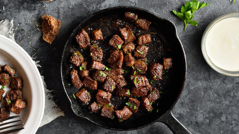 stew meat in cast iron pan