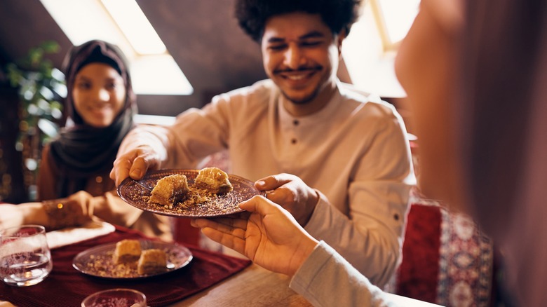 People eating baklava