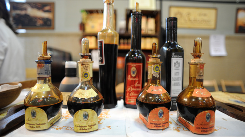 Arrangement of various bottles of balsamic vinegar Modena in Italy