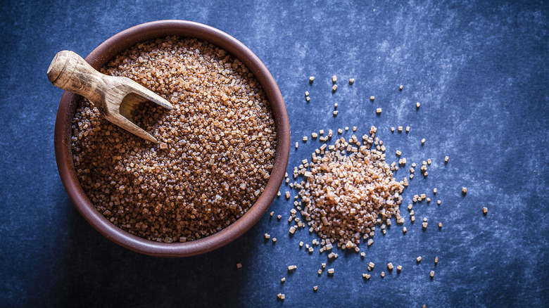 bowl of coarse unrefined brown sugar